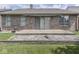 Brick house backyard with concrete patio and low-maintenance stone landscaping at 1645 Oakmere Way, Greenwood, IN 46142