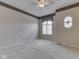 Neutral bedroom with a ceiling fan, window with curtains, and carpet at 1645 Oakmere Way, Greenwood, IN 46142