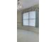 Bedroom with a large window and decorative window treatments at 1645 Oakmere Way, Greenwood, IN 46142