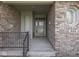 Inviting front porch with brick accents, a wrought-iron railing, and clear home address at 1645 Oakmere Way, Greenwood, IN 46142