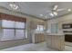 Eat in kitchen featuring an island, pendant lighting, and plenty of cabinet space at 1645 Oakmere Way, Greenwood, IN 46142