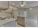 Traditional kitchen with white appliances, countertops, cabinetry, and center island at 1645 Oakmere Way, Greenwood, IN 46142