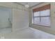Eat in kitchen featuring tile floor, window seat, and white appliances at 1645 Oakmere Way, Greenwood, IN 46142