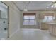 Eat in kitchen featuring tile floor, window seat, and pendant lighting at 1645 Oakmere Way, Greenwood, IN 46142