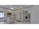 Eat in kitchen with white appliances, an island, and access to the dining room at 1645 Oakmere Way, Greenwood, IN 46142