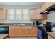 Functional kitchen featuring stainless steel appliances, light wood cabinetry and ample counter space at 16573 Grappa Trl, Fishers, IN 46037