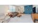 Cozy living room with soft carpeting, comfortable seating, and modern decor at 16573 Grappa Trl, Fishers, IN 46037