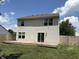 Backyard featuring a deck and lush lawn, perfect for outdoor relaxation and entertainment, complemented by the home's exterior at 187 Broadmoor Bnd, Pittsboro, IN 46167