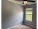Bedroom boasts natural light from a window, neutral walls, and plush carpeting for a cozy and inviting atmosphere at 187 Broadmoor Bnd, Pittsboro, IN 46167