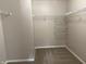 This closet offers ample storage with built-in shelving and rods, providing efficient organization for your wardrobe at 187 Broadmoor Bnd, Pittsboro, IN 46167