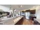 Well-equipped kitchen with granite countertops, a large island, and modern stainless steel appliances at 19824 Atwater Ave, Sheridan, IN 46069