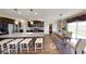 Modern kitchen featuring granite countertops, stainless appliances, and a stylish dining area at 19824 Atwater Ave, Sheridan, IN 46069
