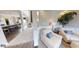 View of open concept living spaces including a sitting room and kitchen area at 19824 Atwater Ave, Sheridan, IN 46069