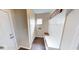 A mudroom equipped with bench and coat hooks, providing storage space and organization at 19824 Atwater Ave, Sheridan, IN 46069