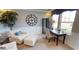 Cozy sitting room featuring stylish furniture, a large window, and a decorative clock at 19824 Atwater Ave, Sheridan, IN 46069