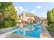 Beautiful backyard with a refreshing pool, complemented by lush greenery, perfect for summer enjoyment at 2320 Whispering Way, Indianapolis, IN 46239