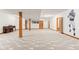 Expansive finished basement offers great space and a sports mural at 2320 Whispering Way, Indianapolis, IN 46239
