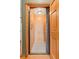 Interior view of an elevator with wood paneling, overhead light, and control panel at 2320 Whispering Way, Indianapolis, IN 46239