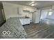 Modern kitchen with granite countertops and white cabinets at 2914 Baltimore Ave, Indianapolis, IN 46218