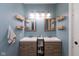 Stylish bathroom featuring double sinks, floating shelves, and modern fixtures at 31 Morningside Ct, Whiteland, IN 46184