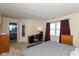 Comfortable bedroom with a large window, desk area, and connecting bathroom at 31 Morningside Ct, Whiteland, IN 46184