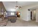 Open living area flows into kitchen and dining, great for entertaining, with lots of natural light at 31 Morningside Ct, Whiteland, IN 46184