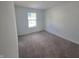 Bedroom with carpeted floors, a window providing natural light at 3142 Lennon Ln, Indianapolis, IN 46235