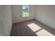 Bedroom with carpeted floors and lots of natural light at 3142 Lennon Ln, Indianapolis, IN 46235