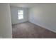 Bedroom with natural light and carpeted floor at 3142 Lennon Ln, Indianapolis, IN 46235