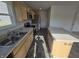 Functional kitchen featuring an island and stainless steel appliances, ideal for modern cooking and entertaining at 3142 Lennon Ln, Indianapolis, IN 46235