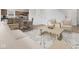 Bright living room with contemporary furnishings, hardwood floors, and an open-concept layout at 3142 Lennon Ln, Indianapolis, IN 46235