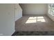 Spacious living room featuring neutral carpeting, offering a comfortable and versatile space to relax and enjoy at 3142 Lennon Ln, Indianapolis, IN 46235