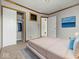 Cozy primary bedroom with closet and a comfortable bed at 320 Sunset Dr, Shelbyville, IN 46176