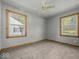 Neutral bedroom with twin windows providing natural light at 320 Sunset Dr, Shelbyville, IN 46176