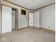 Neutral bedroom with ample closet space and easy access to adjacent areas at 320 Sunset Dr, Shelbyville, IN 46176