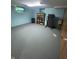 Finished basement offers neutral carpet, drywall block walls and workout area at 4032 Roselawn Ave, Columbus, IN 47203