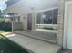 Classic home featuring a brick facade, a covered porch, and a large window for lots of natural light at 4032 Roselawn Ave, Columbus, IN 47203