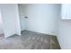 A bright bedroom featuring neutral carpet, natural light, and simple decor at 411 N 18Th St, Noblesville, IN 46060