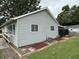 The home features vinyl siding and a small yard at 411 N 18Th St, Noblesville, IN 46060