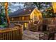 Backyard deck with barbecue, string lights, and cozy seating; perfect for entertaining at 4130 N Meridian St, Indianapolis, IN 46208