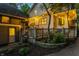 Backyard with a cozy outdoor seating area, string lights, and a home exterior at 4130 N Meridian St, Indianapolis, IN 46208