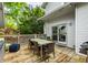 Charming backyard deck furnished with a dining set, grill, and cozy seating for outdoor gatherings at 4130 N Meridian St, Indianapolis, IN 46208