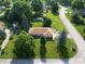 Aerial view of a charming home with well-maintained landscaping and mature trees at 425 Saddle Hill Ct, Indianapolis, IN 46234