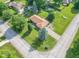Aerial view of a charming home with well-maintained landscaping and mature trees at 425 Saddle Hill Ct, Indianapolis, IN 46234