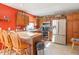 Charming kitchen with stainless steel appliances, ample cabinet space, and tile flooring at 425 Saddle Hill Ct, Indianapolis, IN 46234