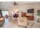 Bright and airy living room featuring a vaulted ceiling and a cozy seating arrangement at 425 Saddle Hill Ct, Indianapolis, IN 46234
