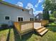 The back yard has a large wood deck for entertaining, and a large grassy yard at 4536 Clayburn Dr, Indianapolis, IN 46268
