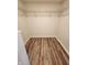 Walk-in closet features durable flooring and metal shelving, providing ample storage space for your belongings at 4536 Clayburn Dr, Indianapolis, IN 46268