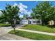 Charming two-story home featuring a well-maintained lawn, attached garage, and inviting curb appeal at 4536 Clayburn Dr, Indianapolis, IN 46268