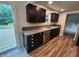 This kitchen boasts modern cabinets, updated stainless steel appliances, and wood-look floors, creating a stylish cooking space at 4536 Clayburn Dr, Indianapolis, IN 46268